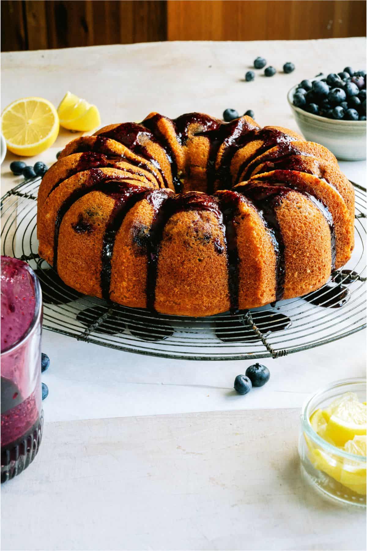 lemon blueberry bundt cake on wire rack.