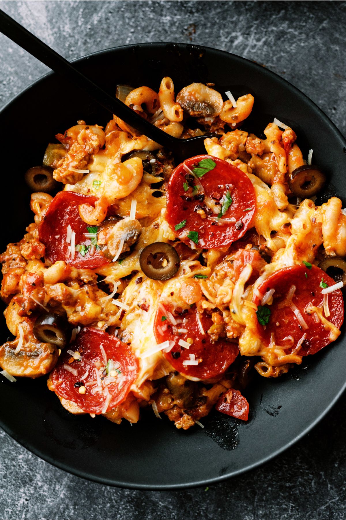 Top view of a serving of Pizza Skillet Pasta in a bowl