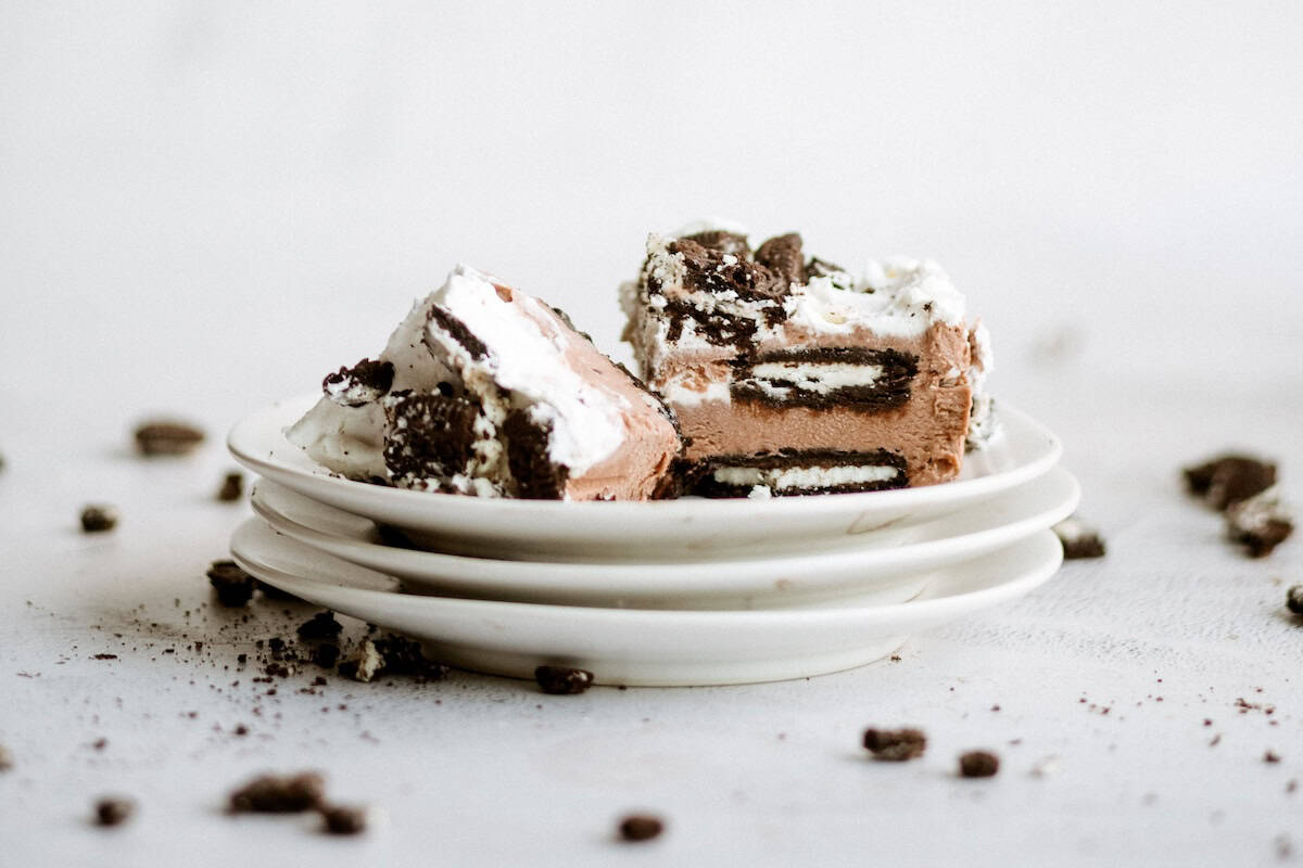 A slice of Oreo IceBox Cake on a plate