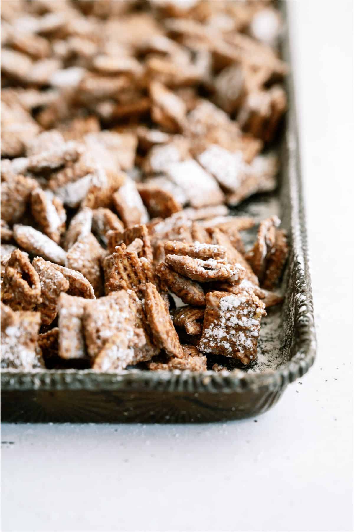 Close up of Muddy Buddies (Puppy Chow) on a baking sheet