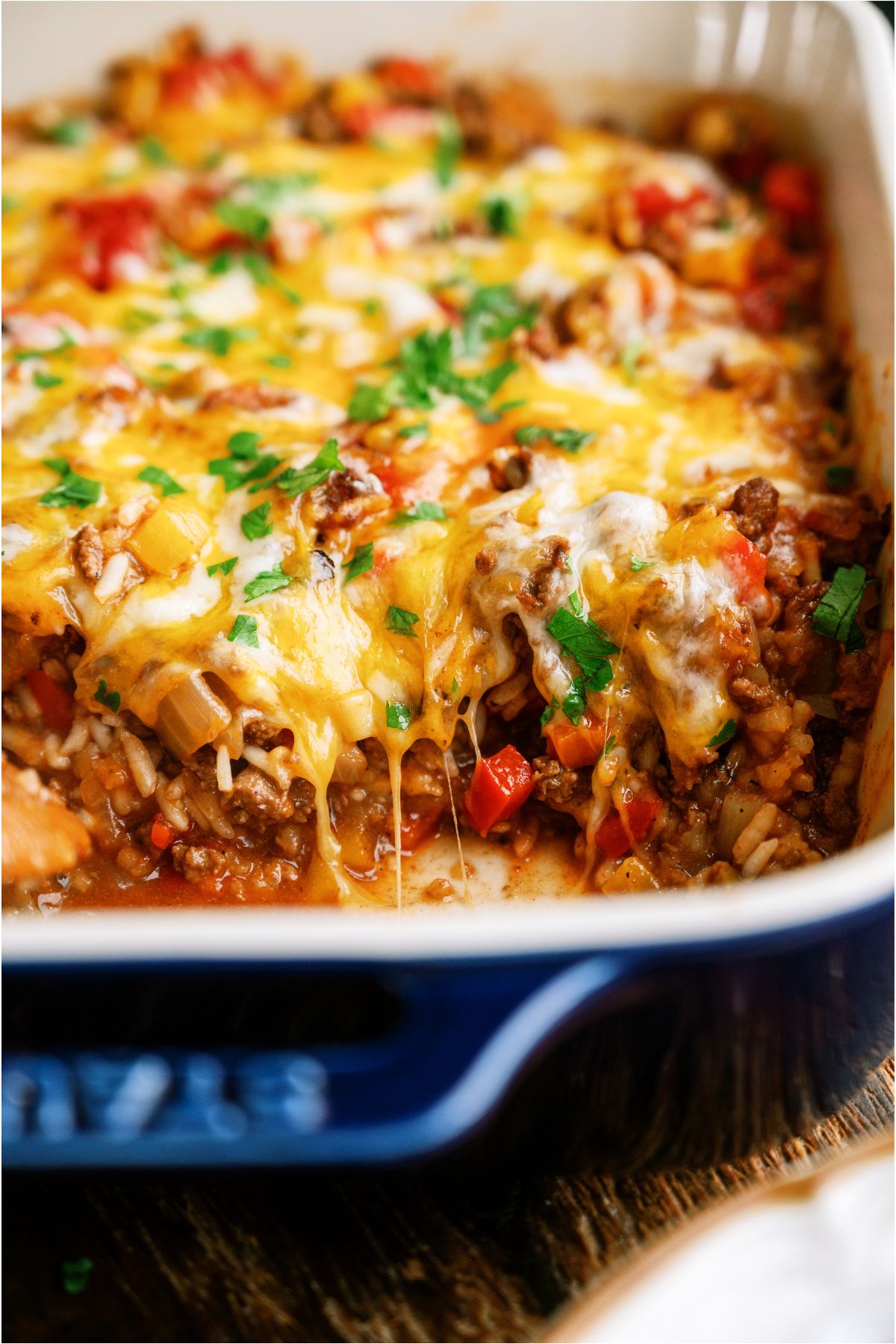 Stuffed Pepper Casserole with a serving missing to show the inside of the casserole.