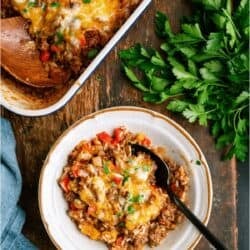 Delicious stuffed pepper casserole with cheese and ground beef in a baking dish.
