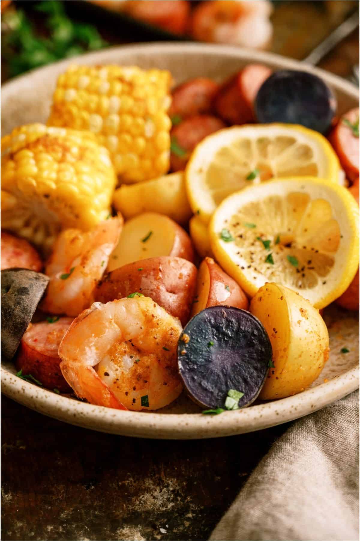 A serving of Sheet Pan Shrimp Boil in a bowl.