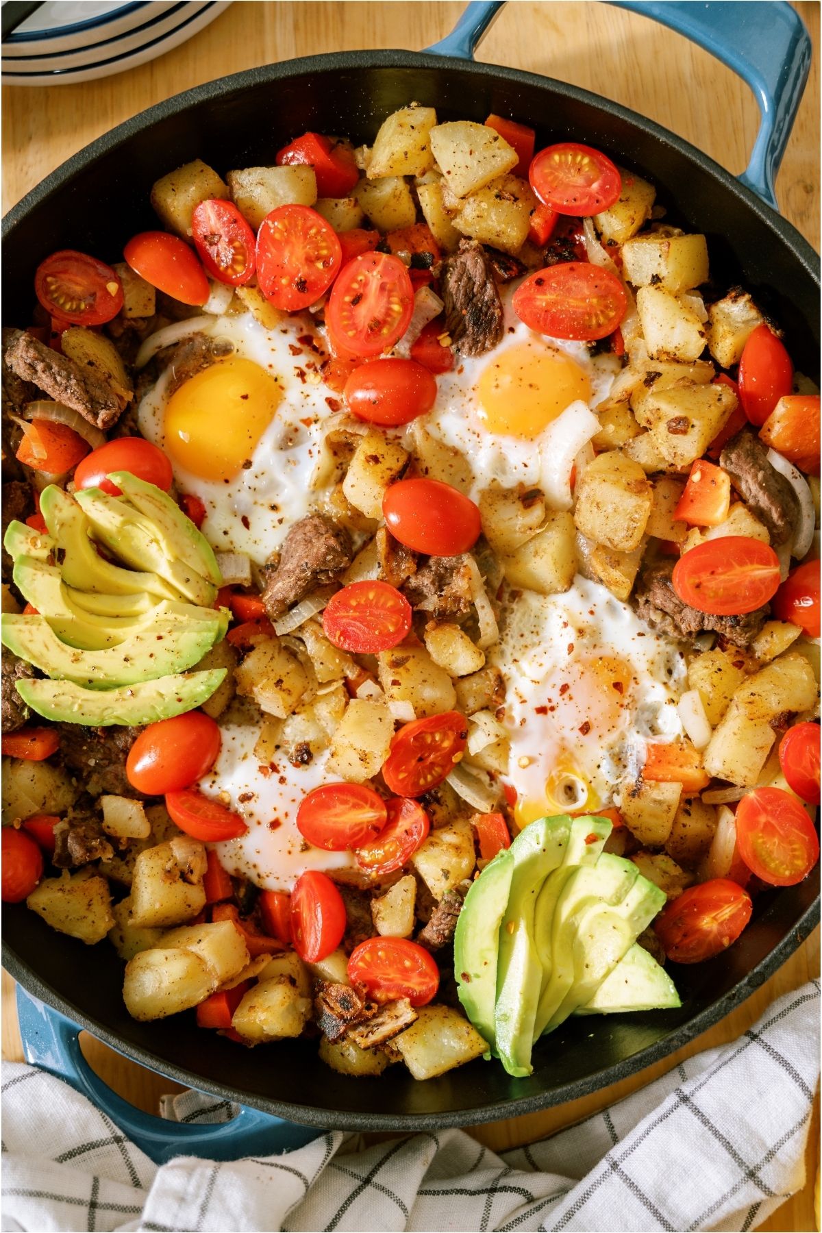 Top view of Steak and Eggs Skillet with veggies.