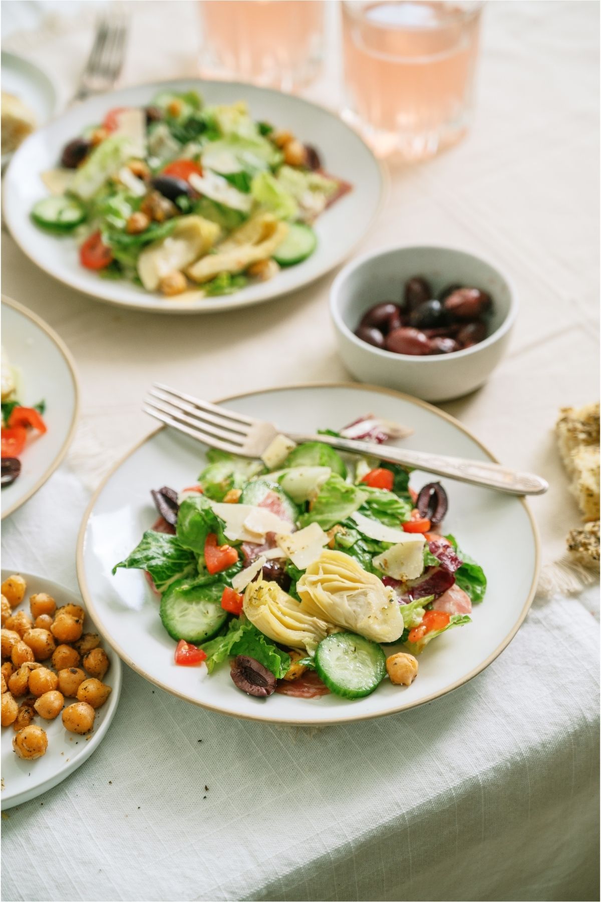 2 plates with Italian Chopped Salad servings on them.