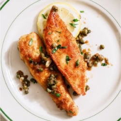 2 pieces of 30-Minute Chicken Piccata on a plate.