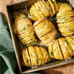 Crispy Hasselback Potatoes in a baking pan.