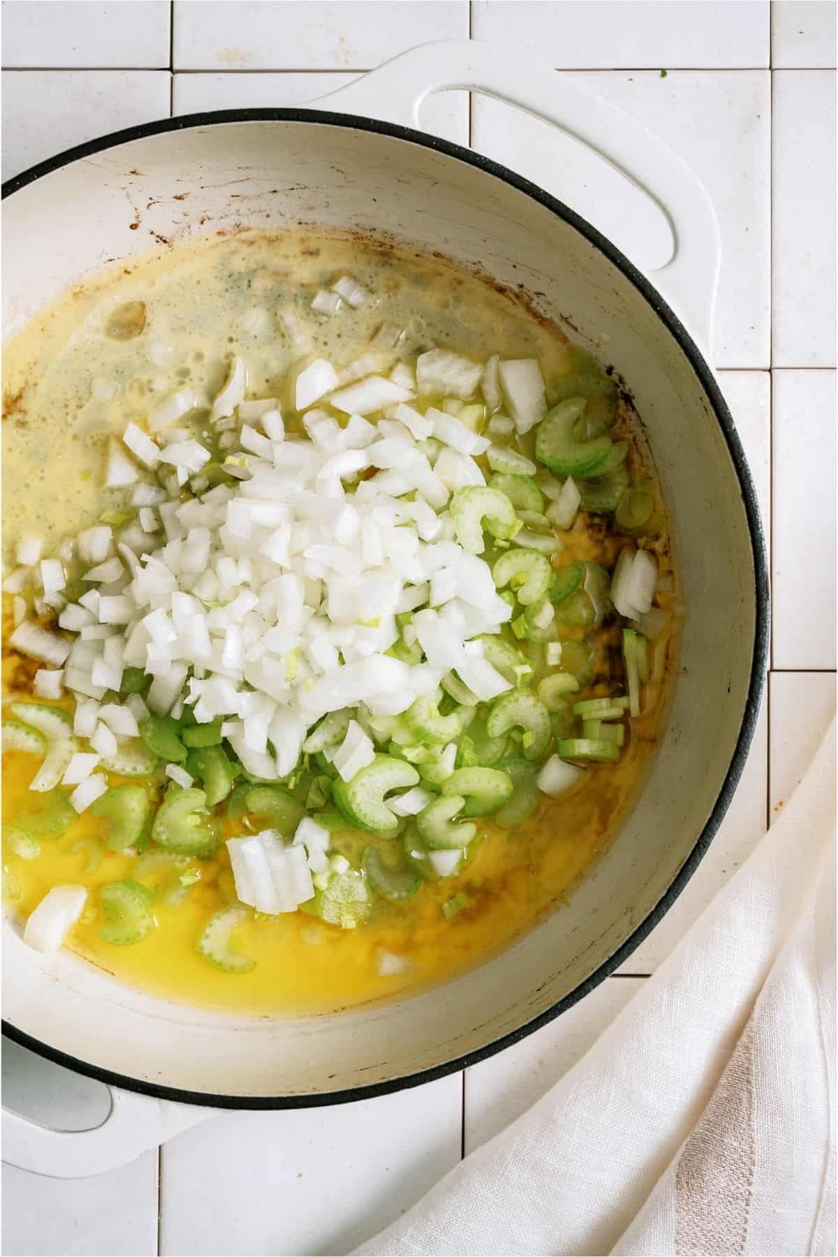 Cooking veggies in a skillet.