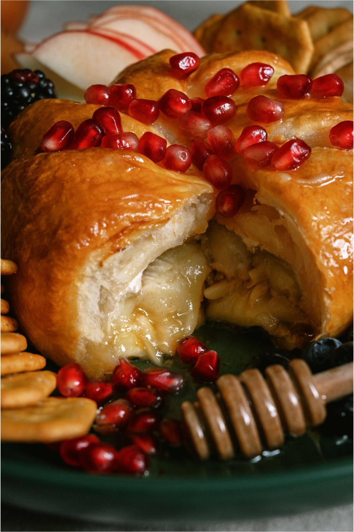 Baked Brie cut open to show the inside.