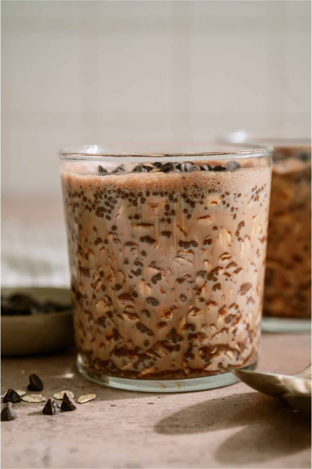 Side view of a jar of Healthy Chocolate Overnight Oats.