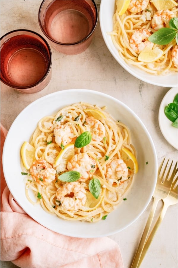 A bowl of Lemon Garlic Shrimp Pasta with a fork on the side.