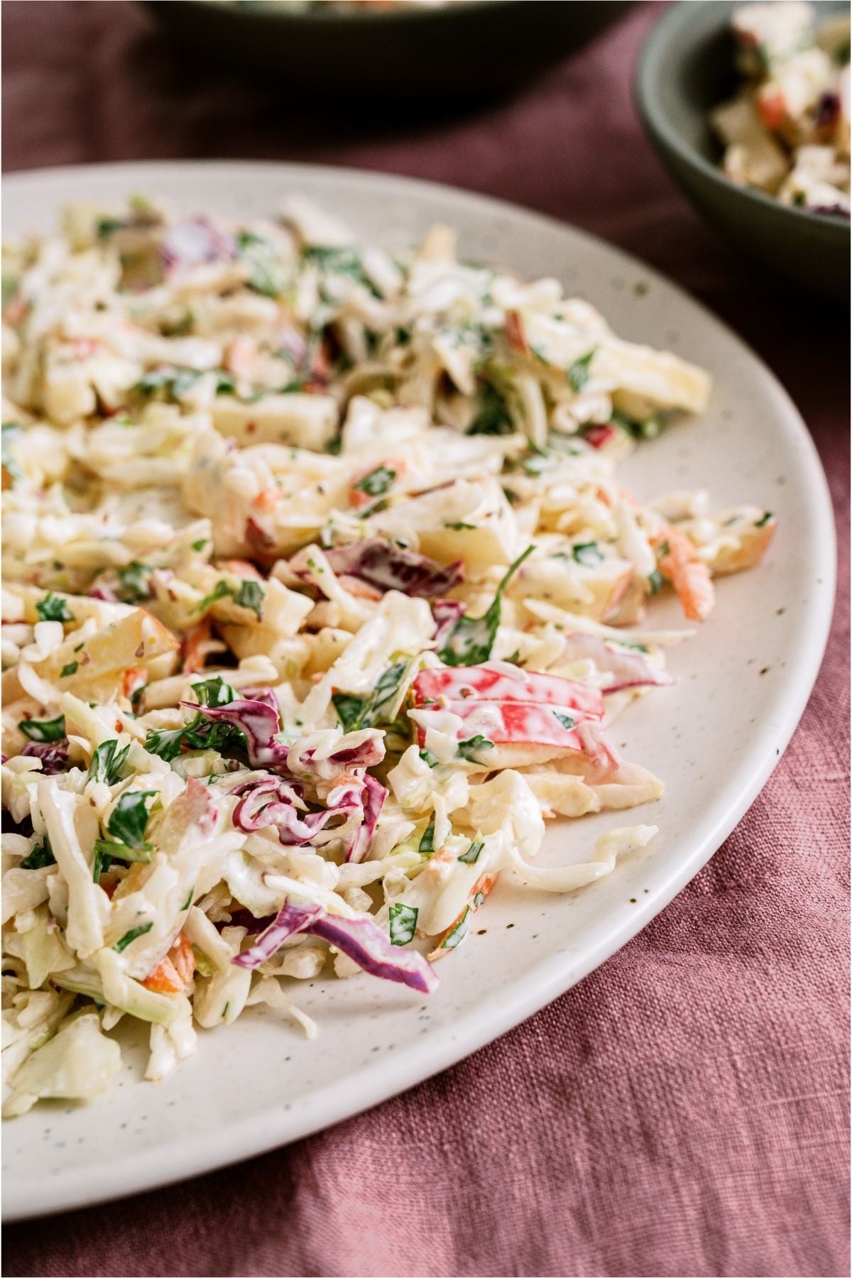 A serving plate full of Apple Slaw.