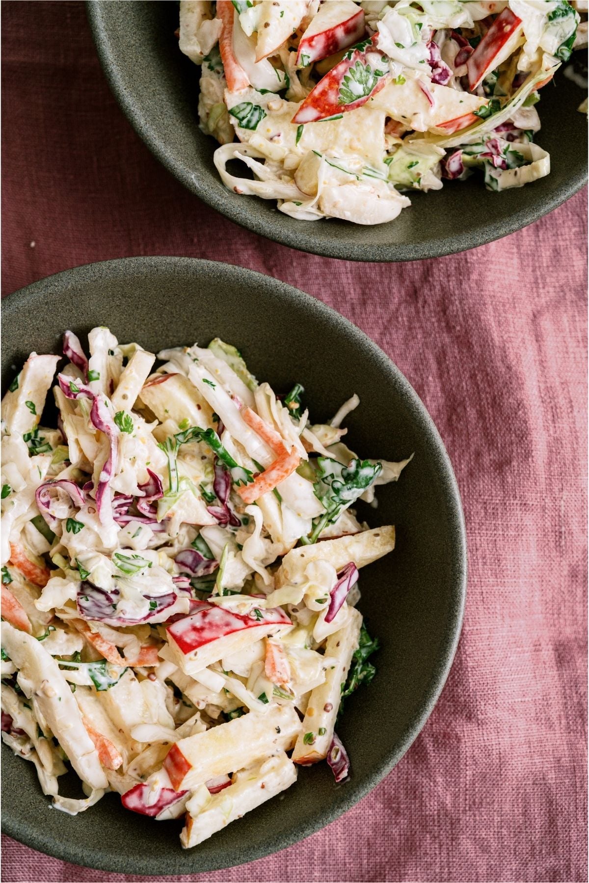 2 bowls filled with Apple Slaw.