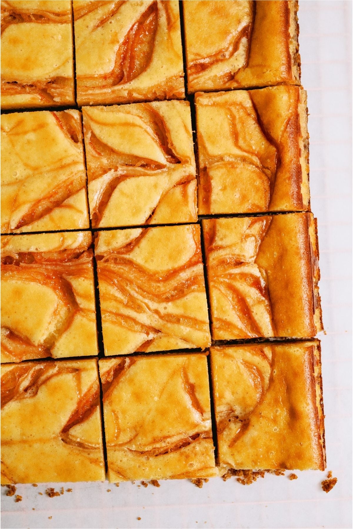 Guava Cheesecake Bars cut into squares.