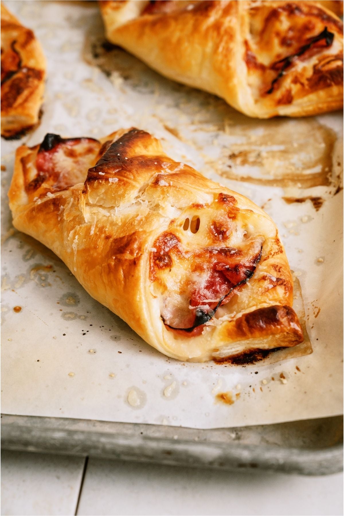 Close up of one Ham and Swiss Puff Pastry.