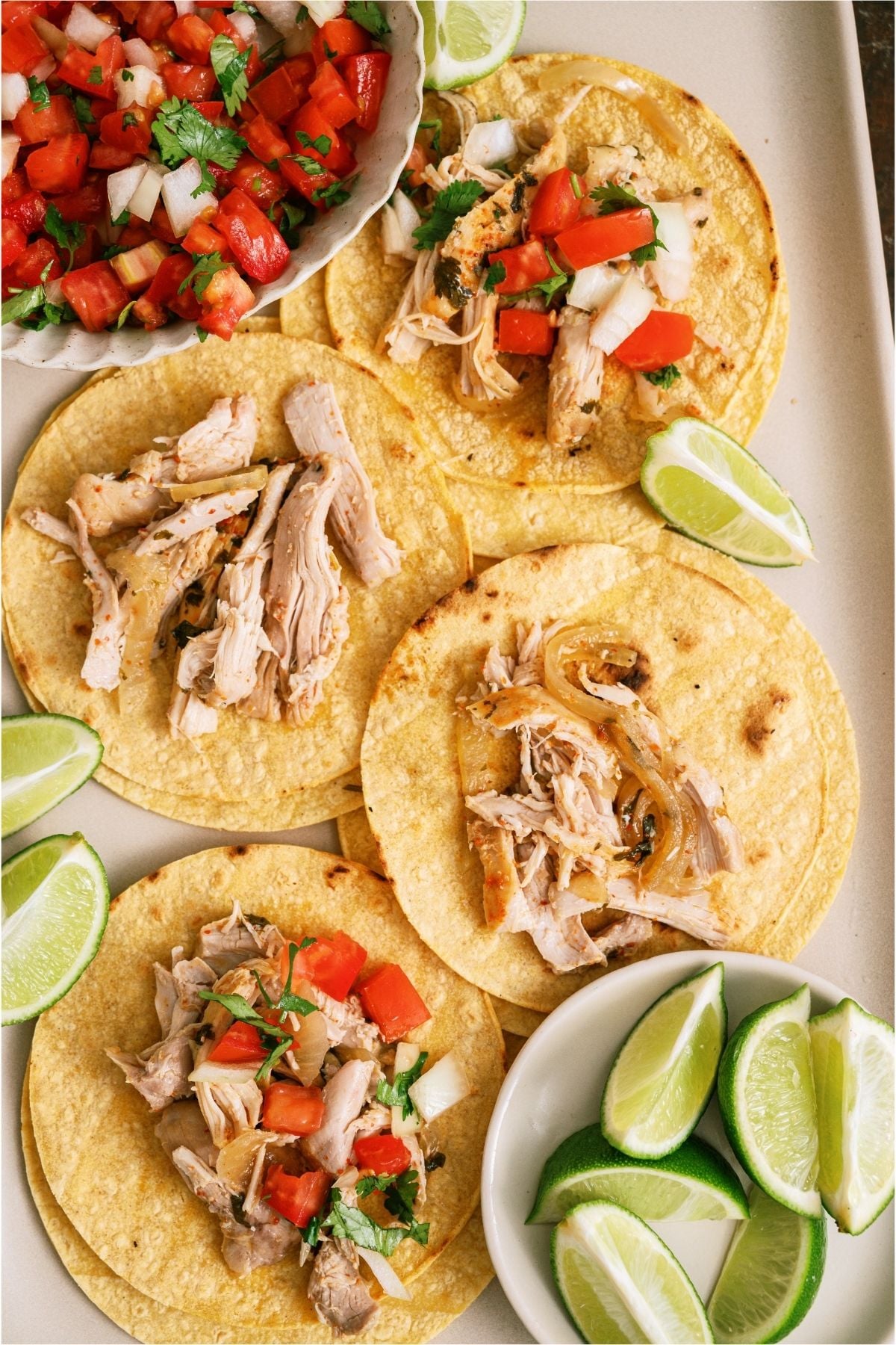 Slow Cooker Chili Lime Chicken on tortillas.