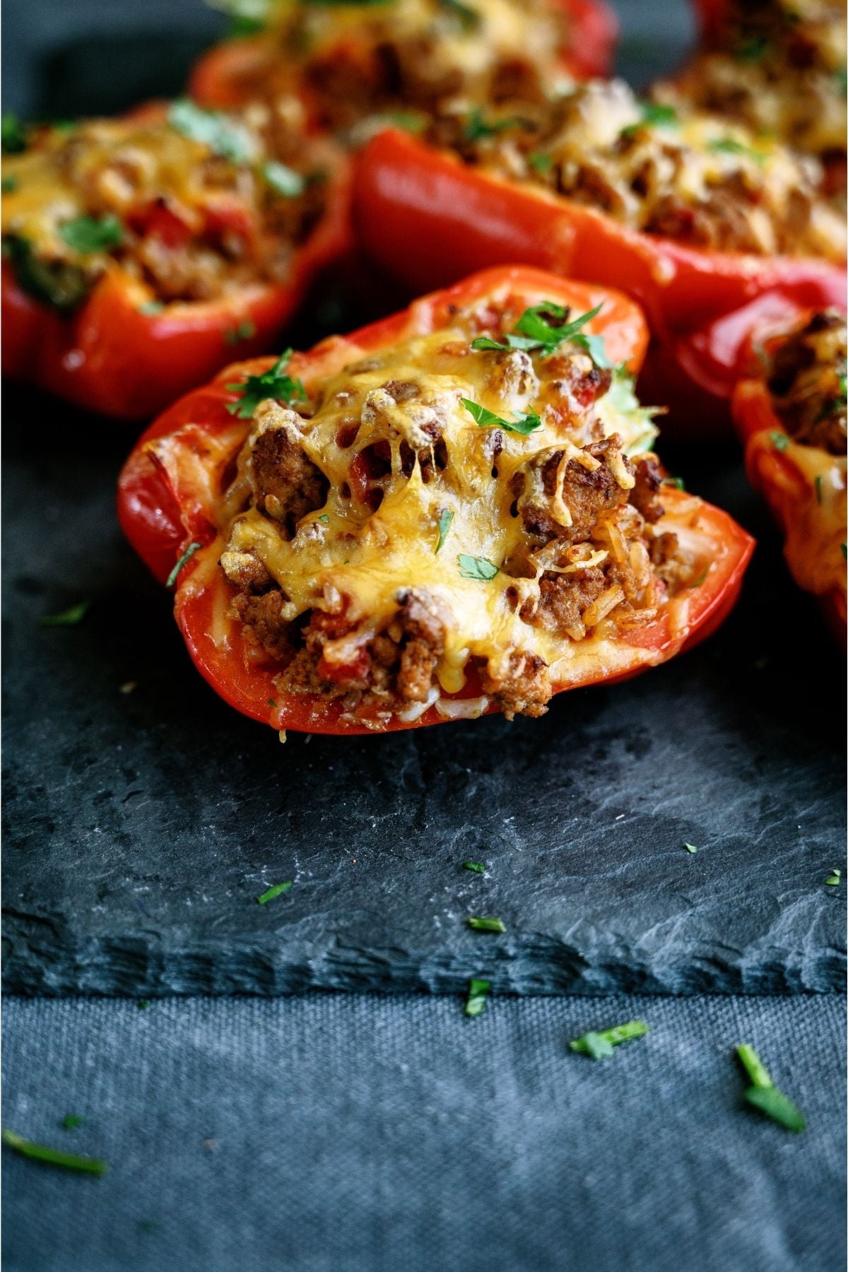 Air Fryer Stuffed Peppers on a blue background.