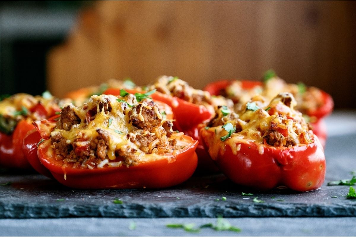 Side view of two Air Fryer Stuffed Peppers.