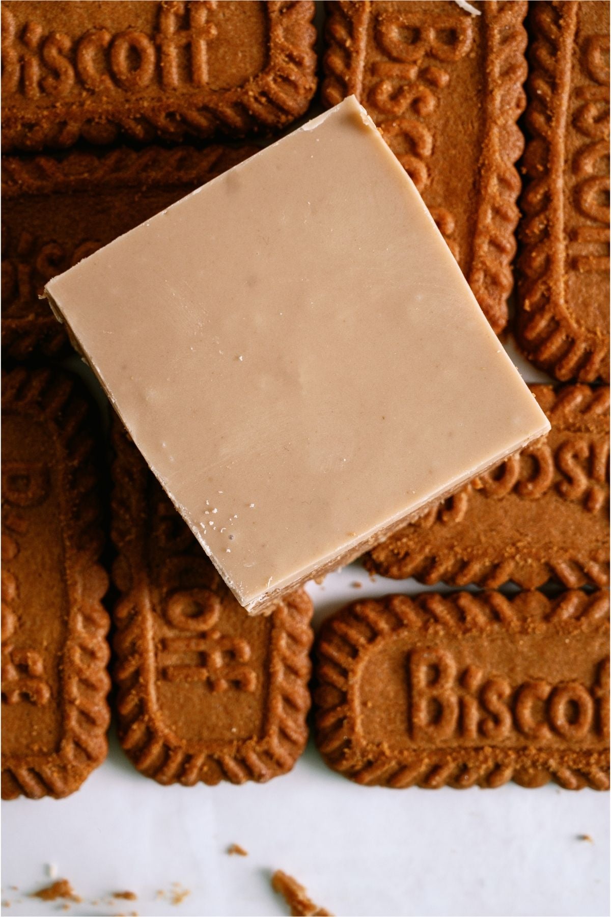 Top view of a No Bake Biscoff Bar on top of biscoff cookies.