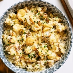 Crispy Smashed Potato Salad in a serving bowl.