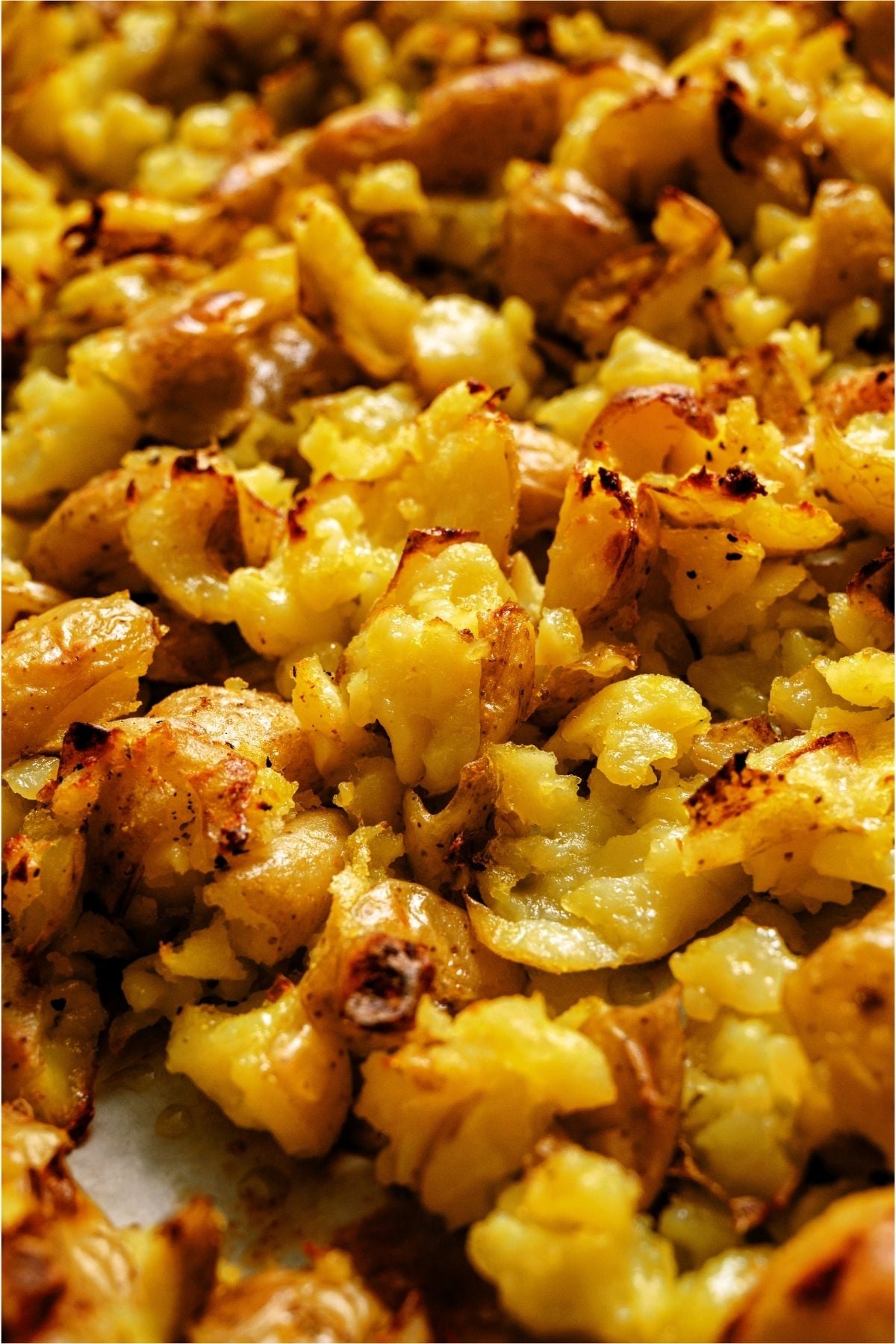 Baked Crispy Smashed Potatoes on a sheet pan.