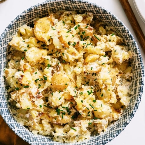 Crispy Smashed Potato Salad in a serving bowl.