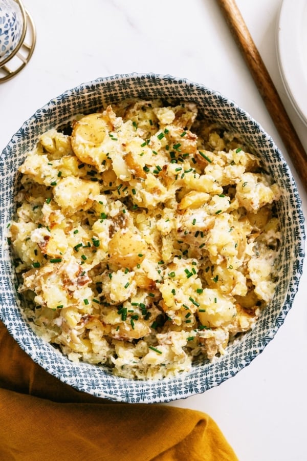Crispy Smashed Potato Salad in a serving bowl.