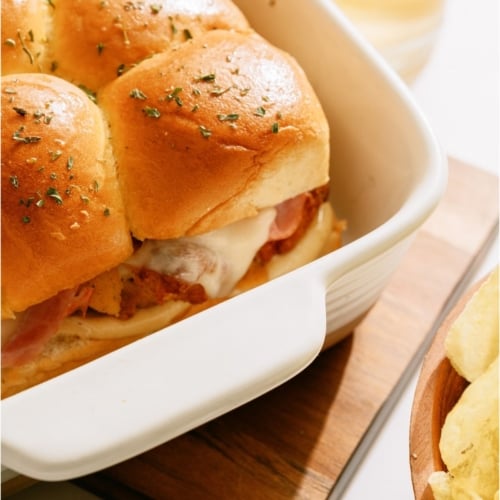 Top view of Chicken Cordon Bleu Sliders ib a baking dish.