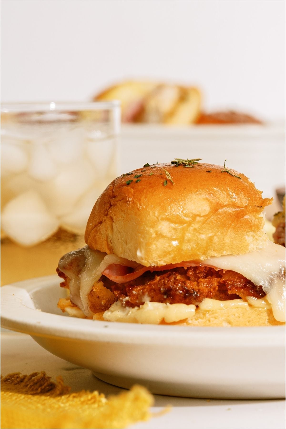 A Chicken Cordon Bleu Sliders on a plate.