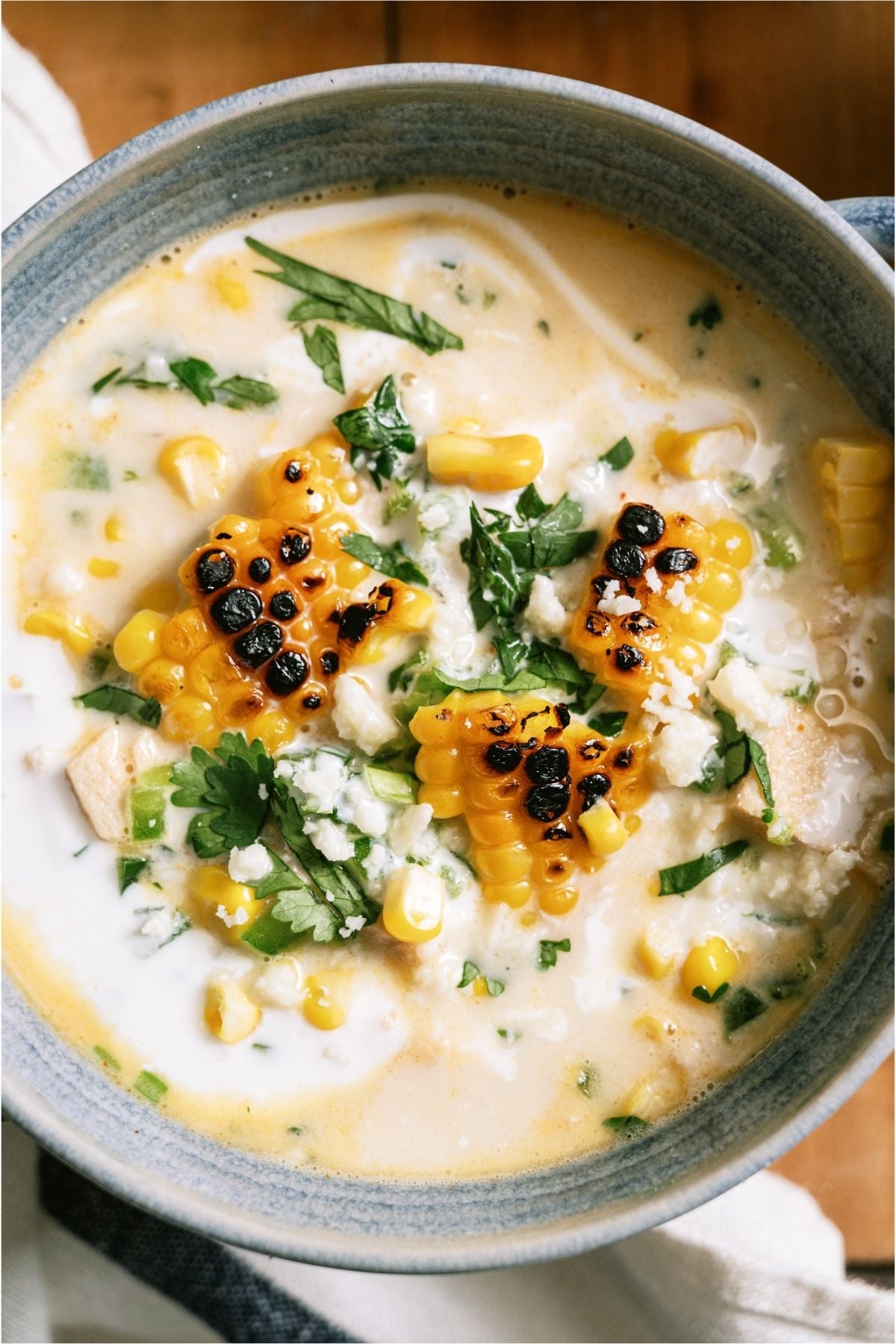 A bowl of Slow Cooker Street Corn Soup.