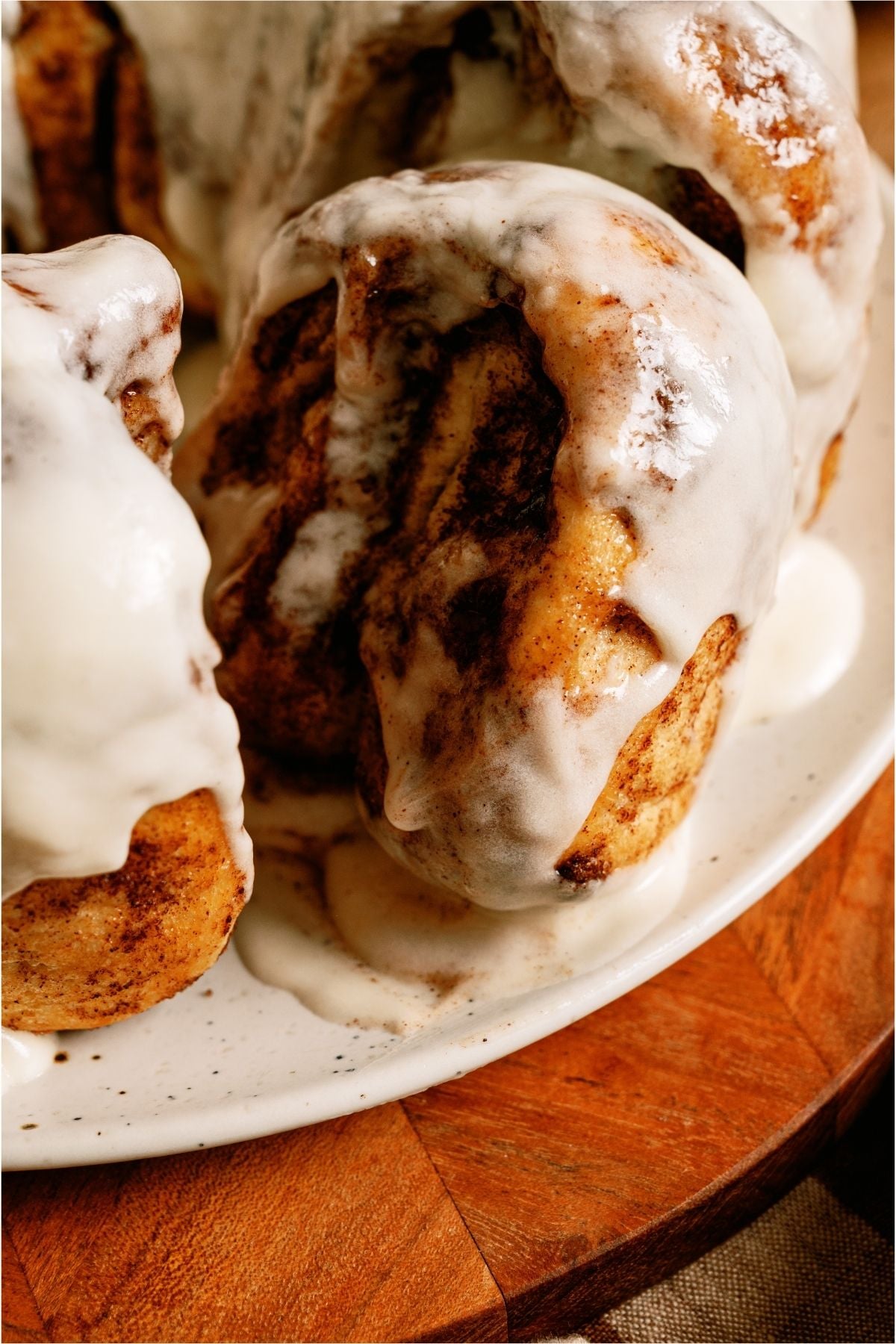 Close up of a slice of Mom’s Cinnamon Pull Apart Bread on a serving plate.