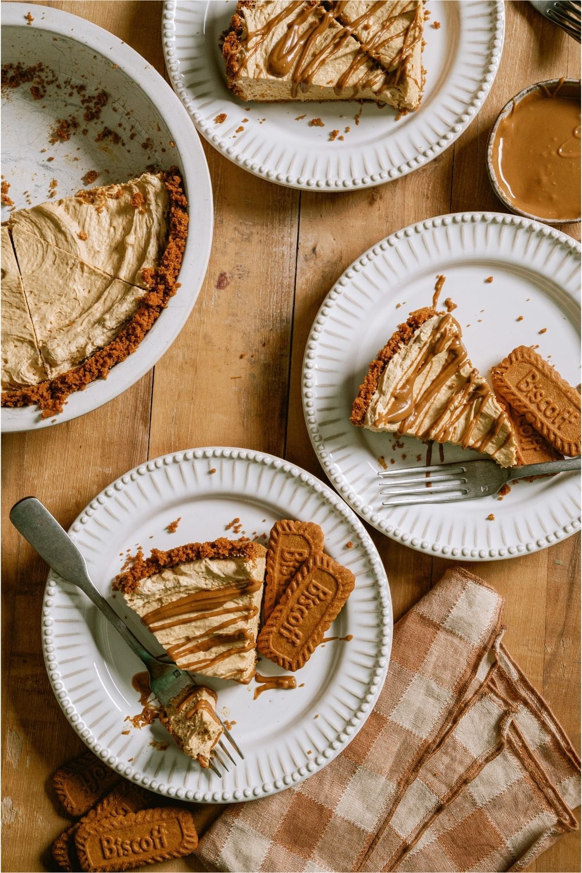Top view of several slices of No Bake Biscoff Cheesecake on plate.